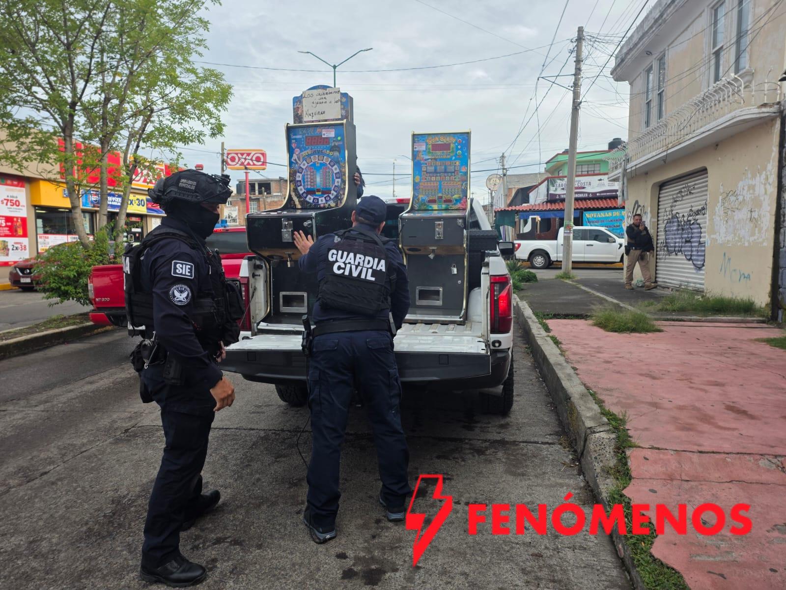 Guardia Civil apoya en cateos donde aseguran 64 máquinas tragamonedas en Morelia